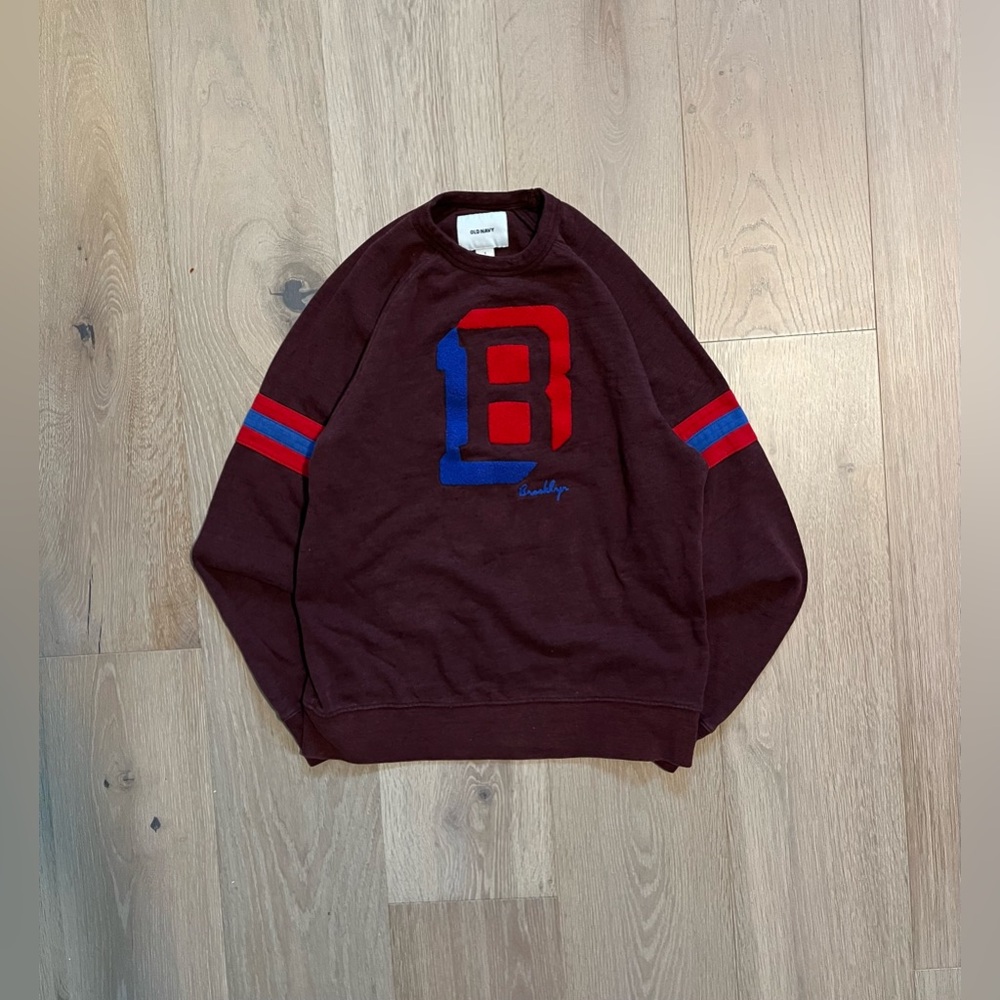 Brown old navy sweater with Red and blue embroidered stripes and symbols